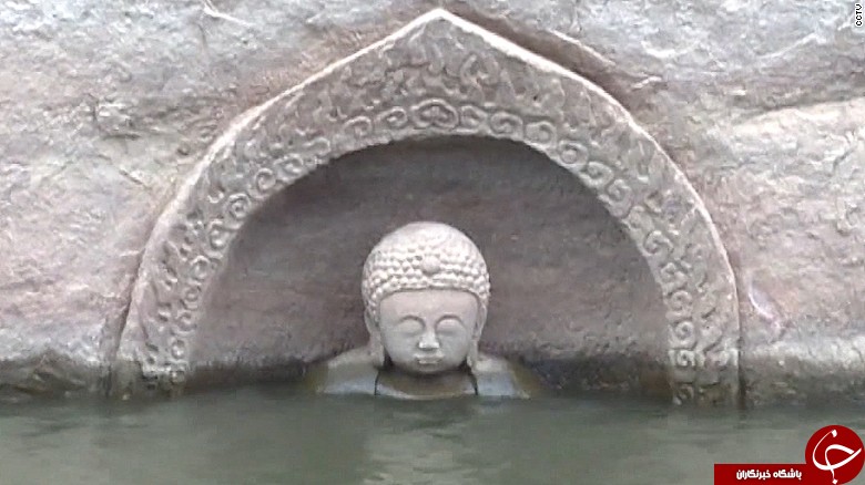 پیدایش یک مجسمه 600 ساله بودا از زیر آب در چین+ تصاویر
